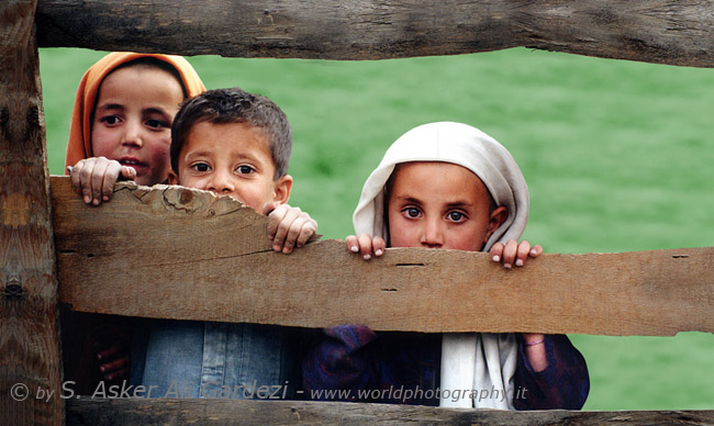 Kids Behind Fence